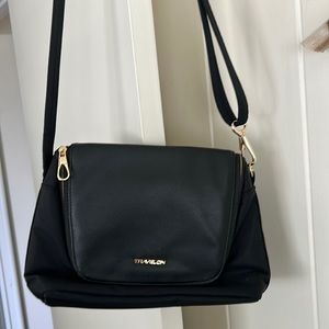 Travelon black travel safety purse.